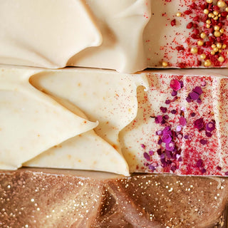 close up of cold process soaps topped with bio glitter sparkle, mica and beads