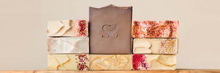 All Blissed Botanical Co Comfort & Joy cold process soaps stacked together